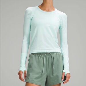 Swiftly tech cyan blue waist length long sleeve tee